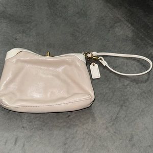Authentic gently used coach small wristlet with brass hardware